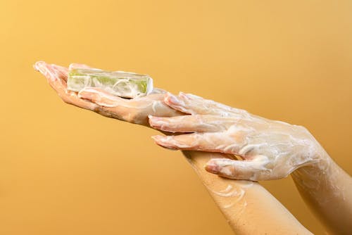 Soap Bubbles on a Person's Hands