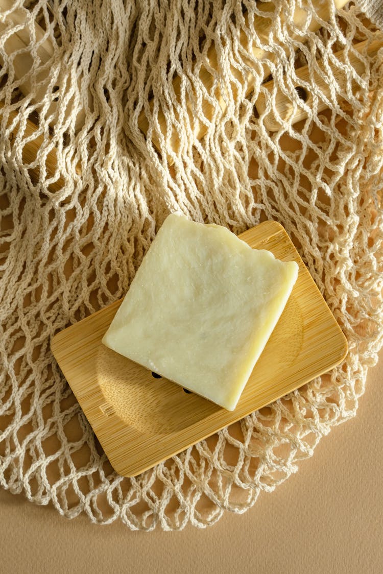 Overhead Shot Of Soap Bar On A Wooden Surface