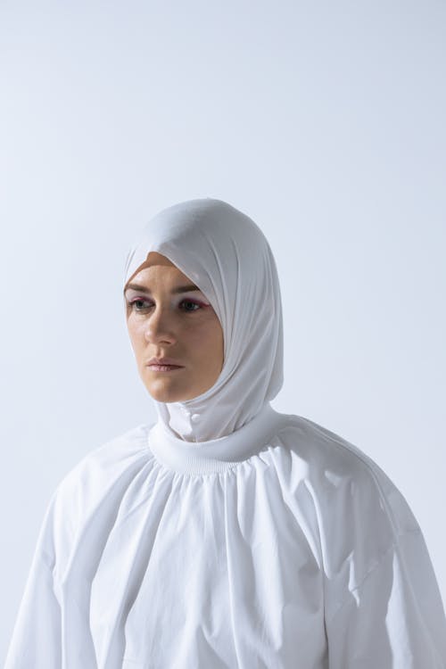 Woman in White Hijab Standing