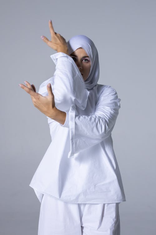 Woman in White Long Sleeve Clothes