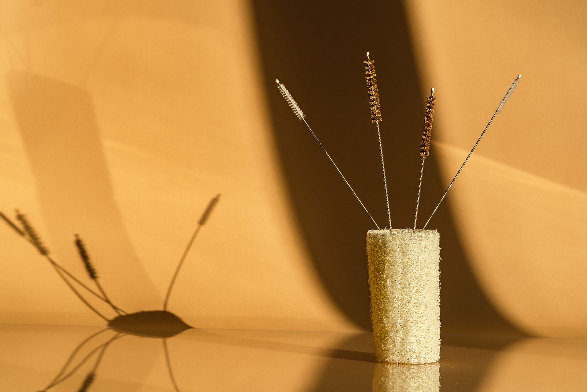 Cleaning Tools in a Sponge on Yellow Background