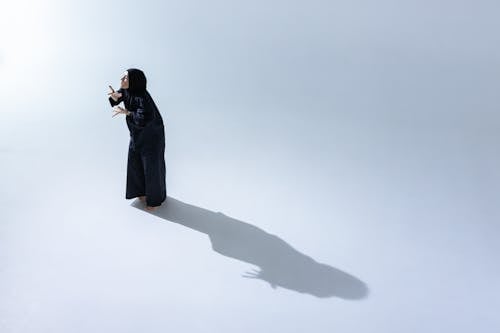 Woman Wearing Black Hijab and Abaya