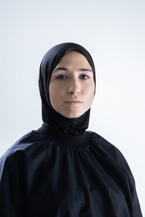Woman in Black Hijab and Black Long Sleeve Top · Free Stock Photo