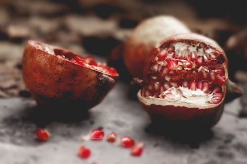 Free Close-Up Photo of Pomegranate with Red Seeds Stock Photo