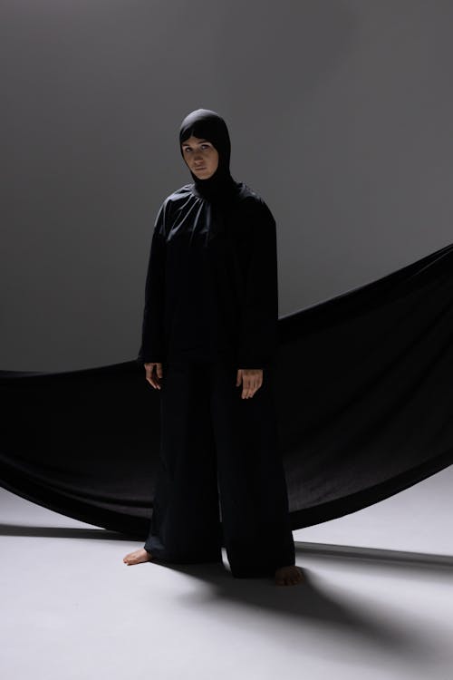 Woman in Black Hijab Standing