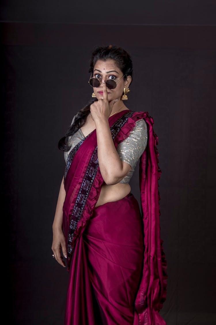 Woman Wearing A Magenta Saree