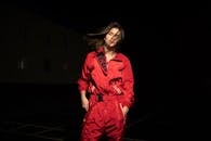 Woman Wearing a Red Jumpsuit