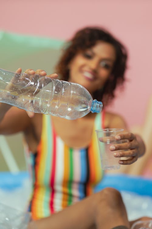 Foto d'estoc gratuïta de abocar, aigua, ampolla de plàstic
