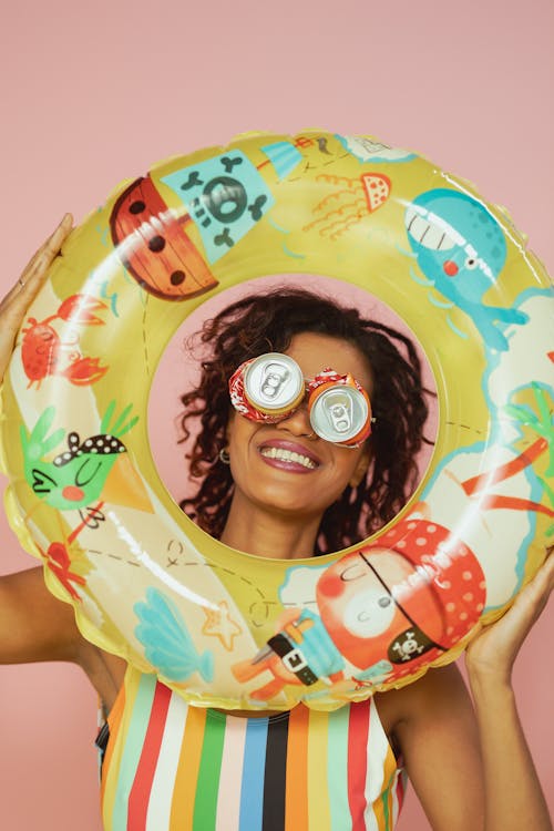 Woman Wearing Swimsuit Holding a Inflatable Ring