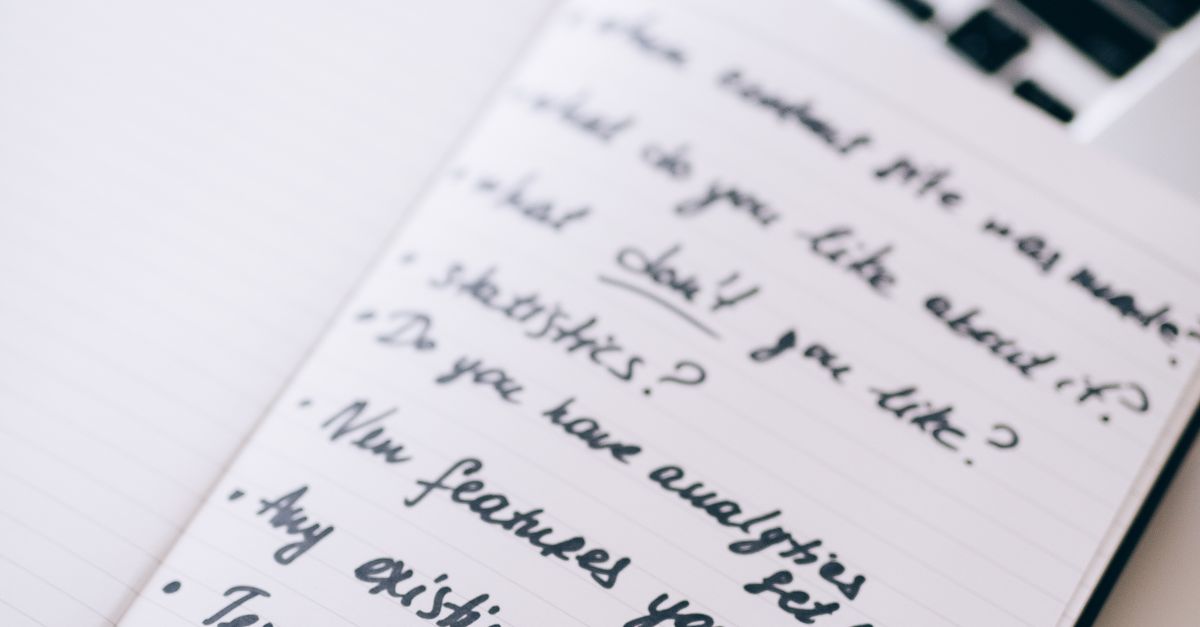 Notebook Shots Close-up Shot of an Open Notebook with Notes · Free Stock Photo