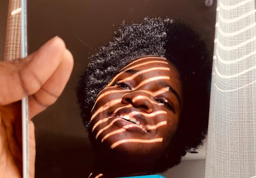 Reflection of a Woman Smiling 