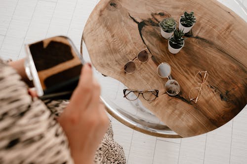 Eyewear on Top of Wooden Table