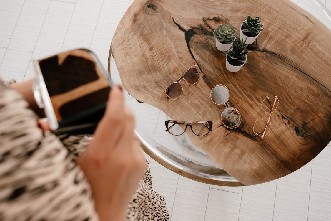 Eyewear on Top of Wooden Table