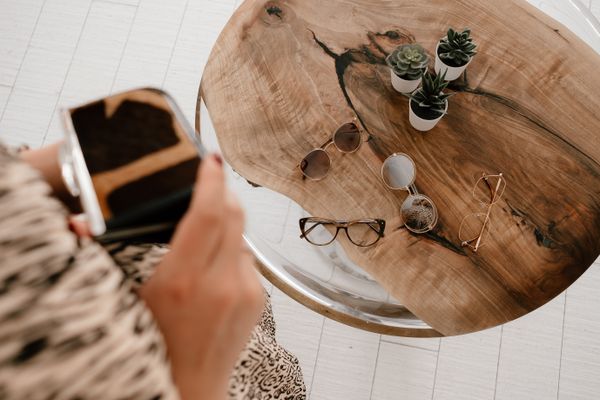 Eyeglasses and sunglasses on a rustic wooden table — Maria Ovchinnikova on Pexels