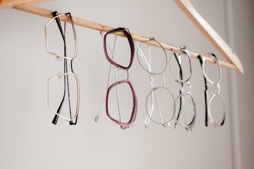 Free Glasses Frames Hanging on a Clothes Hanger Stock Photo
