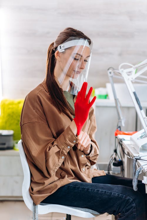 Free Woman Wearing a Red Glove Stock Photo
