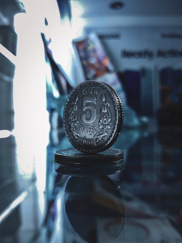 Close-Up Of Rupee Coins