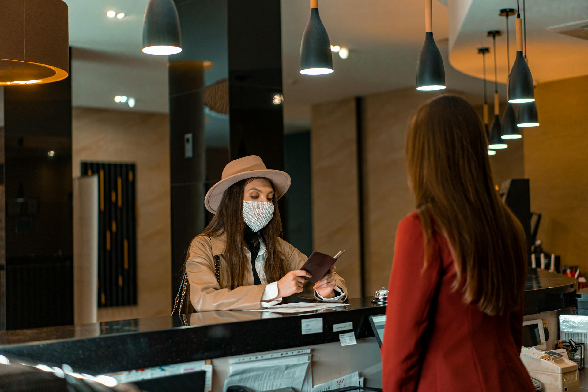 A Woman Standing at the Counter