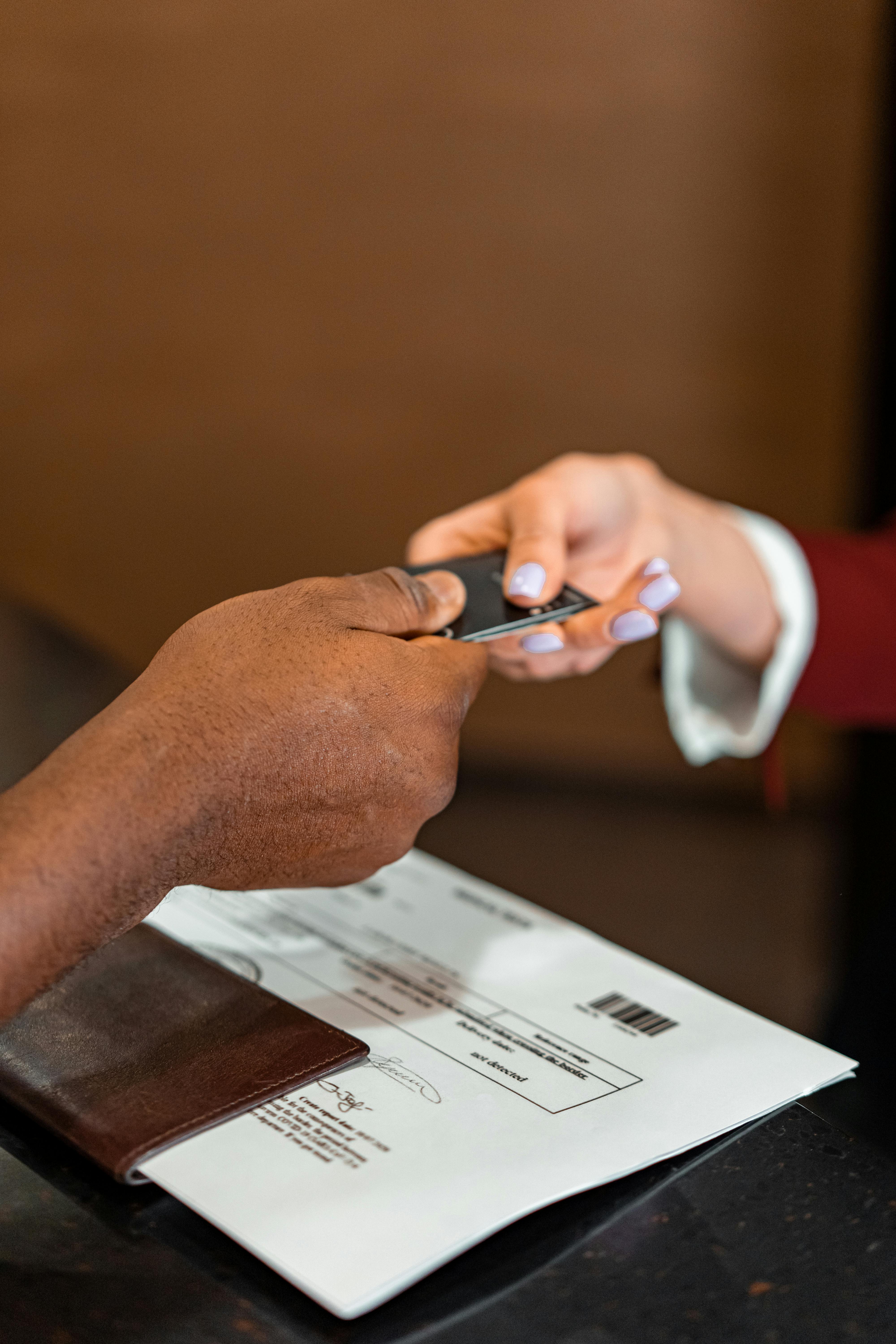 a person holding a card