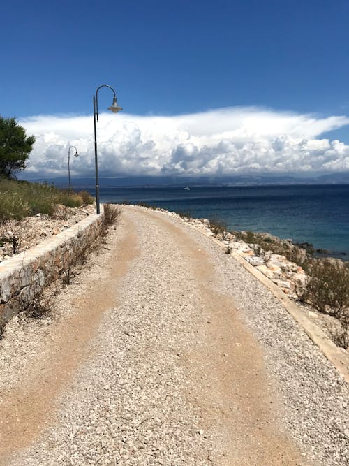 Free stock photo of beach, blue, coastal road