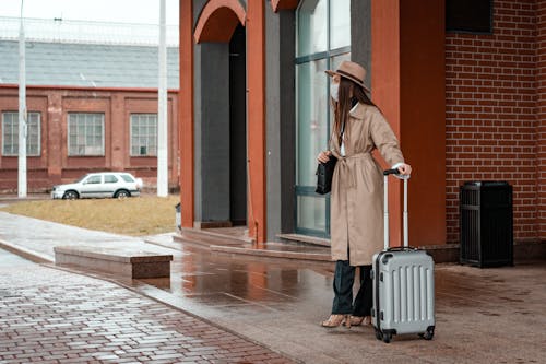 Free A Woman in Brown Trench Coat Stock Photo