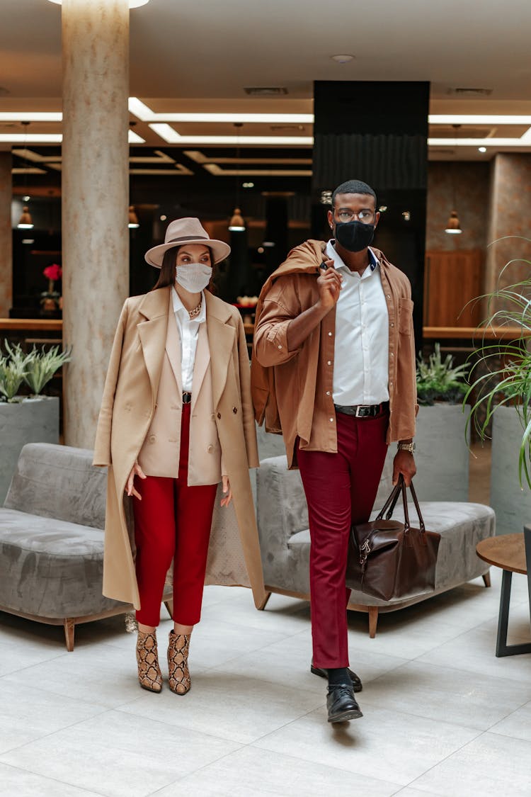 Couple Standing Together On A Hotel Lobby