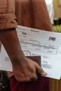 Person Holding White Printer Paper