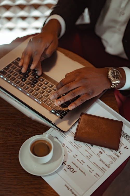 Free Close Up Shot of a Person Using Laptop Stock Photo