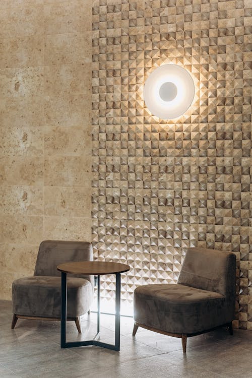 Minimal Design of Chairs and Table on a Hotel Lobby