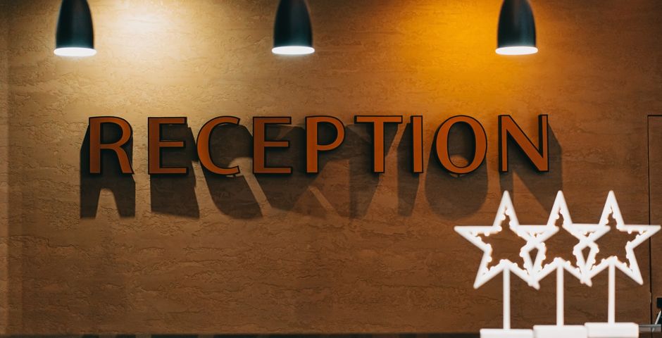 An elegant hotel reception area — the reputation a pest programme protects