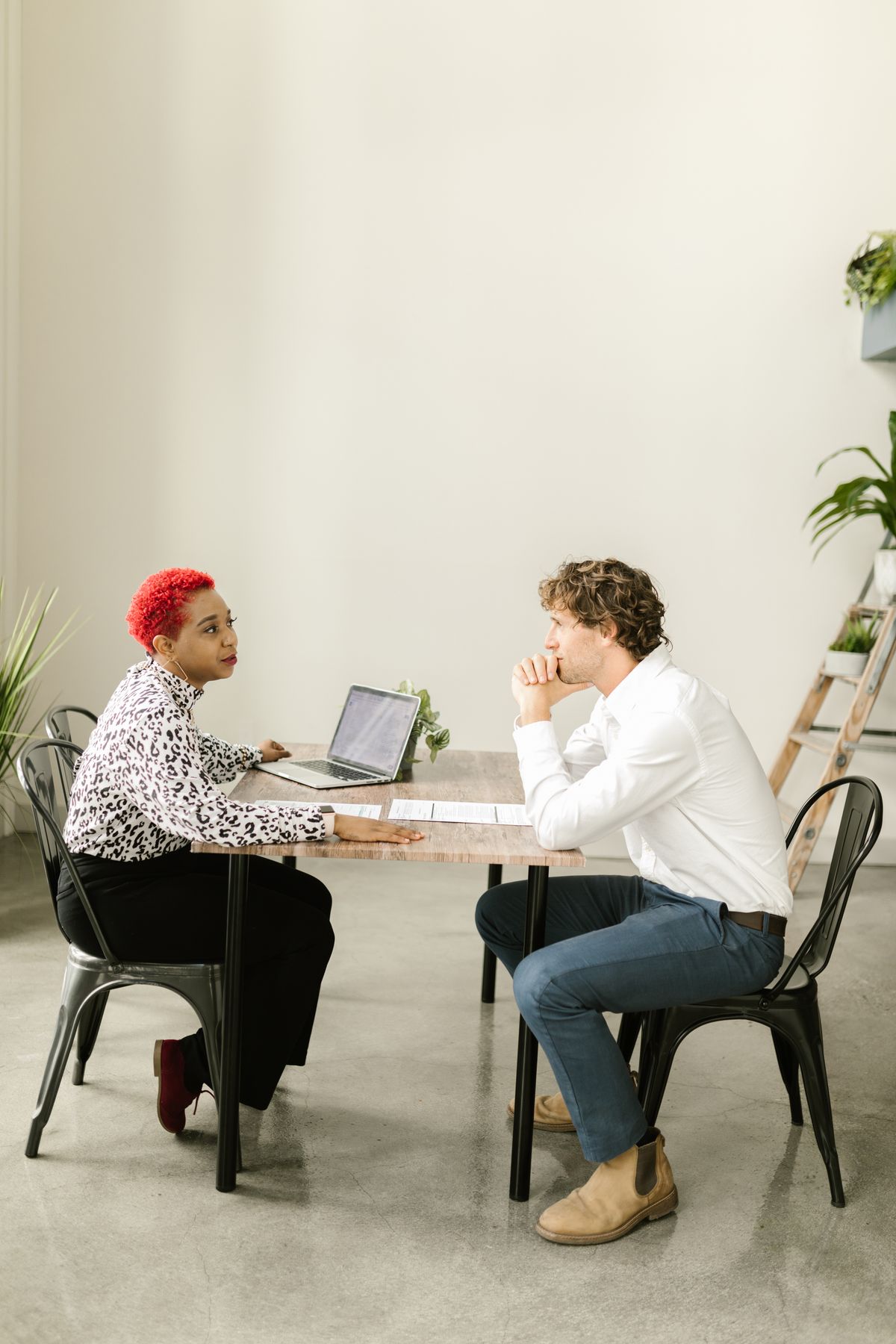 Researchers discussing findings together at a table