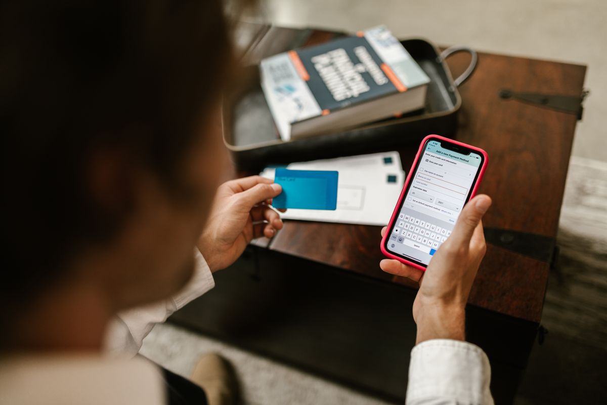 Person checking banking and personal credit options on a smartphone screen