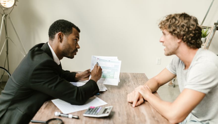 Solicitor consulting with client
