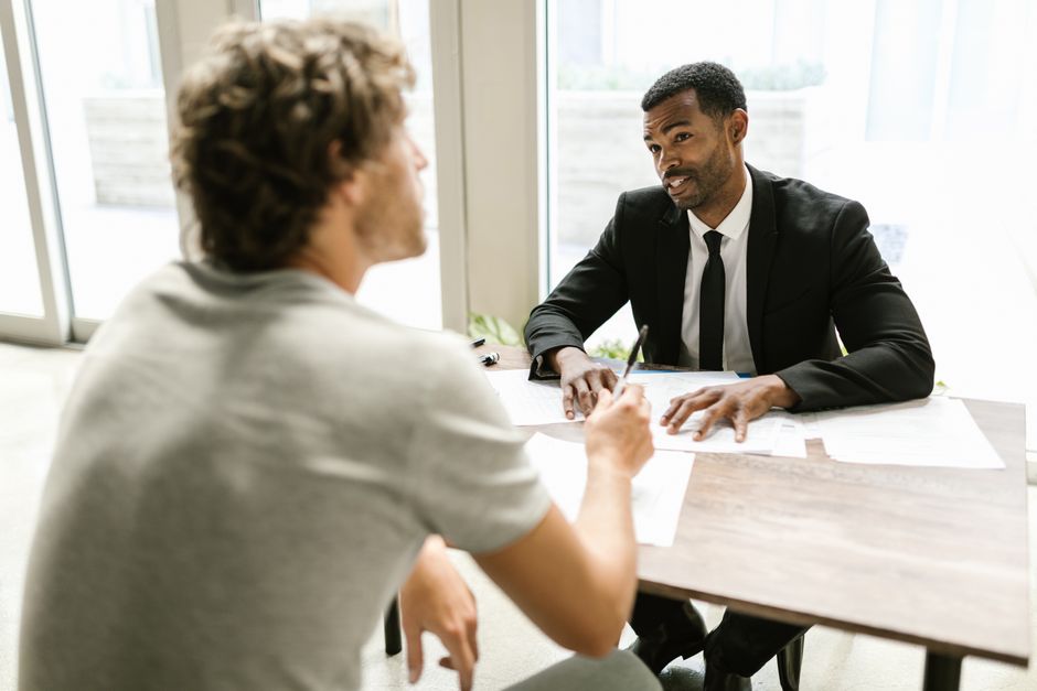 professional insurance broker consulting with client