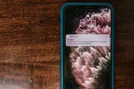 Close-up of a Cellphone on a Wooden Surface