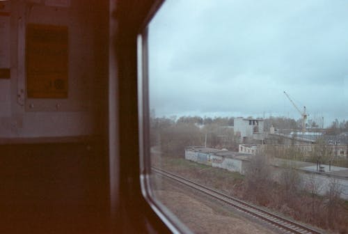 Бесплатное стоковое фото с 35 мм, зерно, окно поезда
