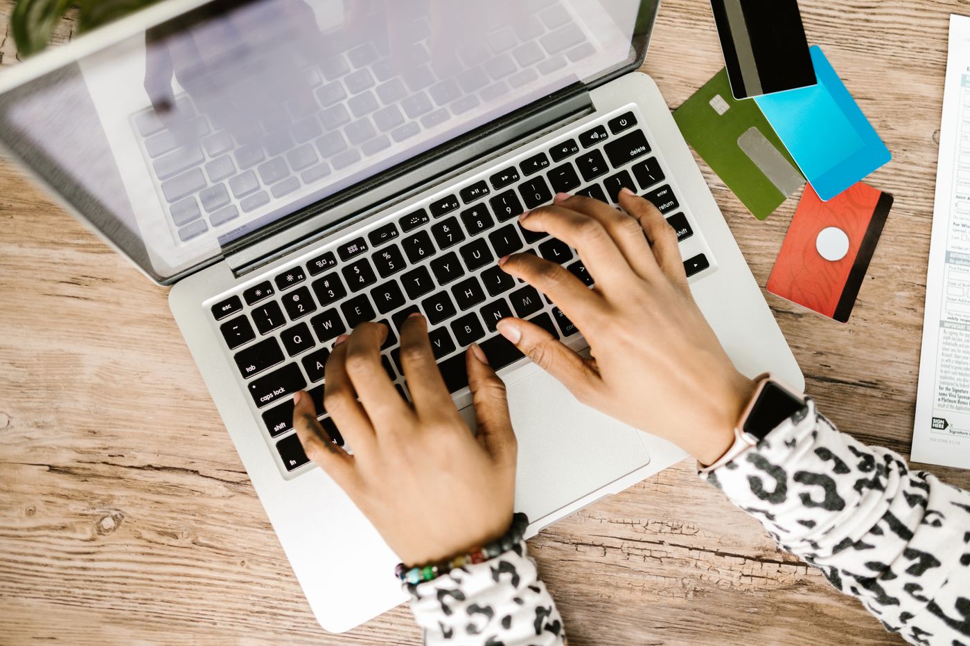 Financial planning with laptop and credit information