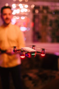 Vibrant indoor scene featuring a drone with red lights and blurred bokeh background.