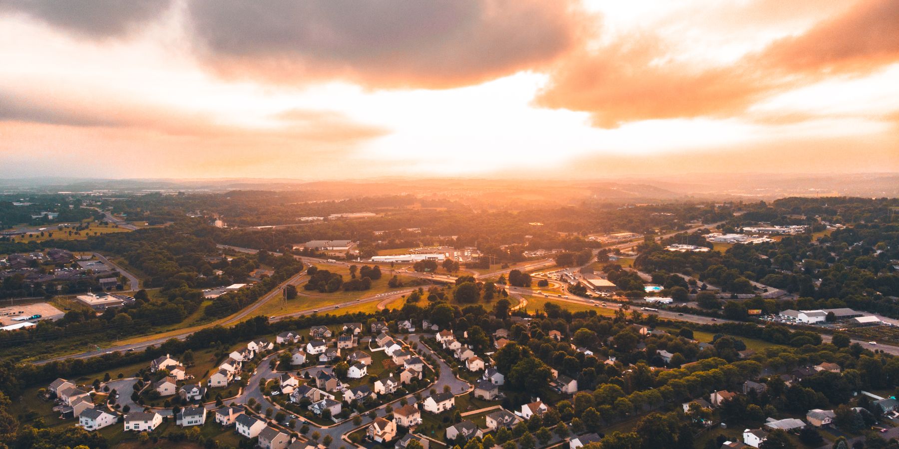 Stunning aerial photograph capturing a residential area in Allentown, PA during sunset.