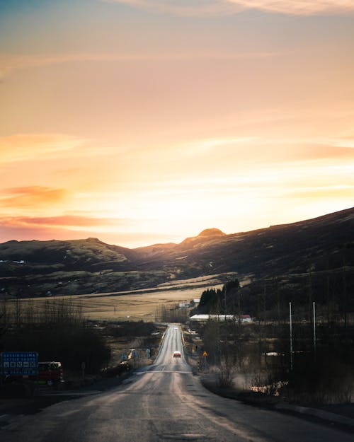 Photos gratuites de aube, autoroute, coucher de soleil