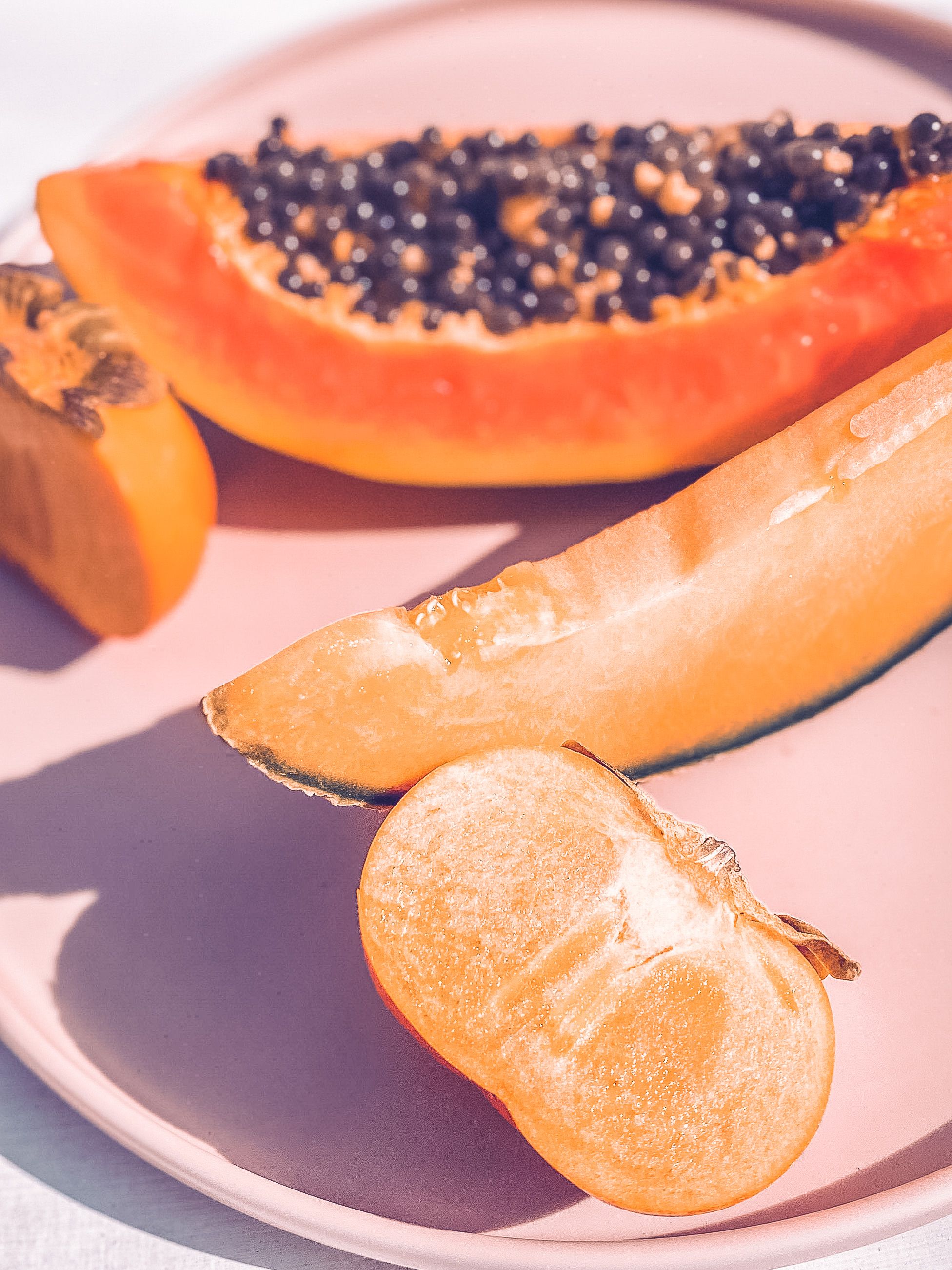 Thinly sliced Fuyu persimmons tossed with peppery greens, toasted nuts, and a light vinaigrette for a bright fall salad.