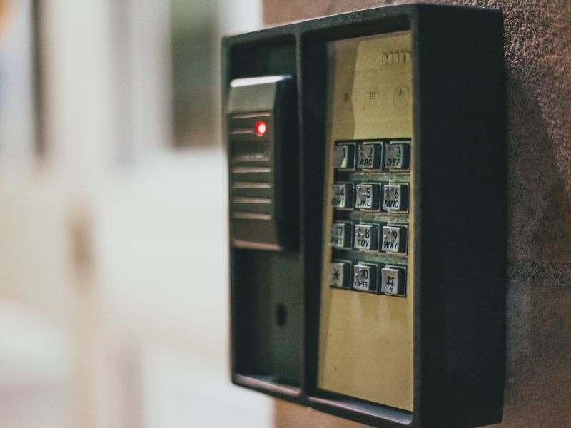 Access control keypad beside a door