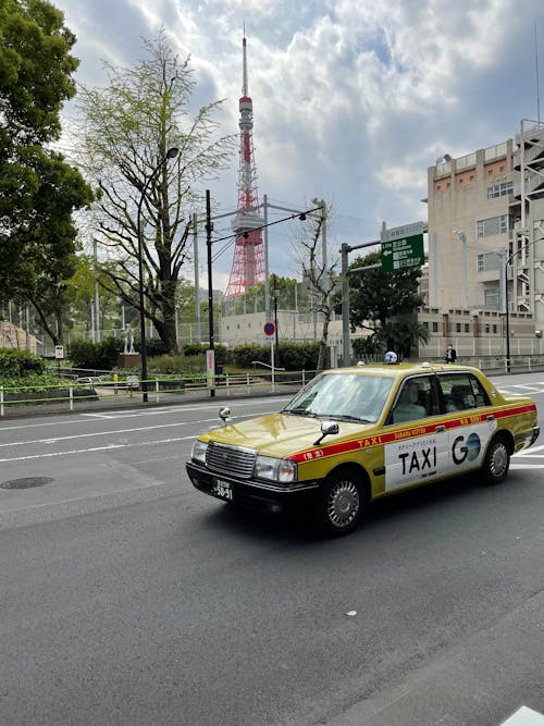 Taxi Driving Down the Road