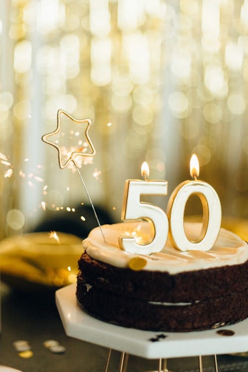 Free A Birthday Cake with Lighted Candles on Top Stock Photo