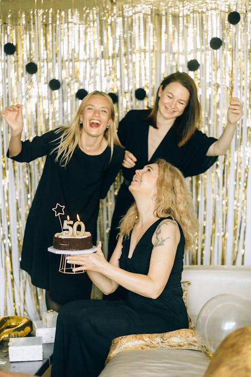 Free Woman Celebrating Her Birthday with Friends Stock Photo