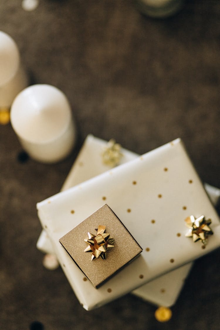 Presents Covered In Gold And White Wrapper