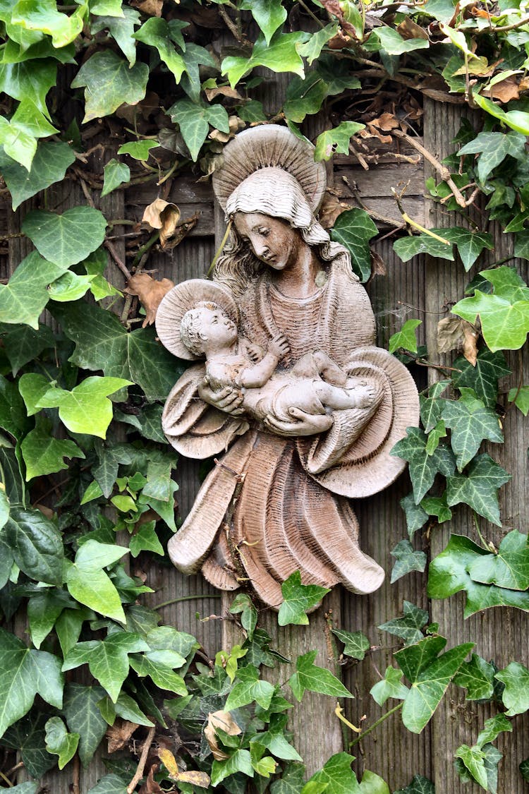 St Mary And Jesus Statue On Fence