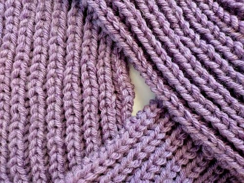 Free Close-Up Shot of a Purple Knit Textile Stock Photo