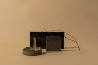 Black and Brown Speaker on Brown Wooden Table