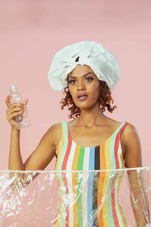 Woman Wearing a Swimsuit with Plastic on her Head